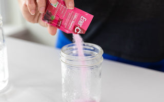 Ener-C sachet raspberry multivitamin drink mix pouring