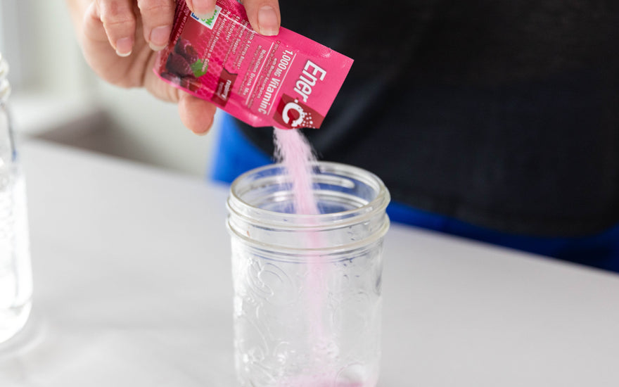 Ener-C sachet raspberry multivitamin drink mix pouring