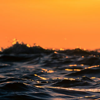 Orange sunset sky above the ocean | Original Ener-C